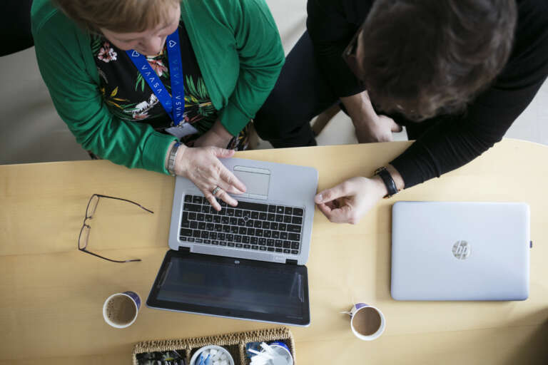 2 people and computer